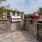 Outdoor grill stations and mini fridge