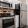Stainless steel appliances and white cabinetry